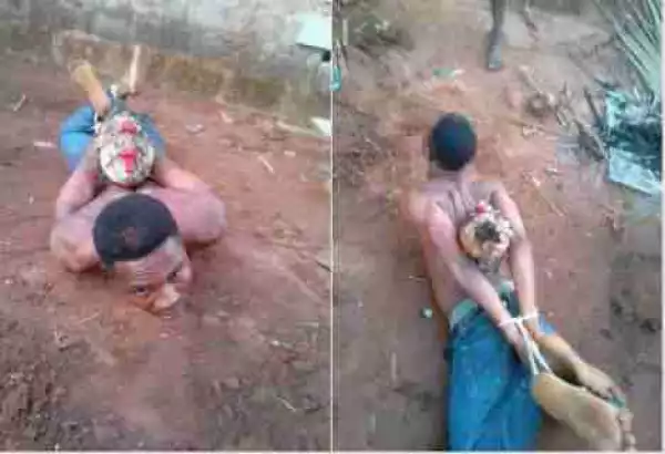 Pastor caught while trying to bury pot of charm at someone’s compound (Photos)